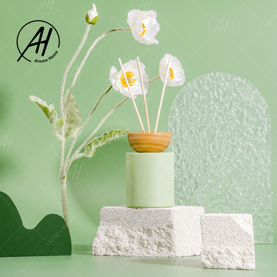 Le cadeau a placé les bâtons blancs en verre verts à la maison de rotin de Reed Diffuser 150ml de bouteille