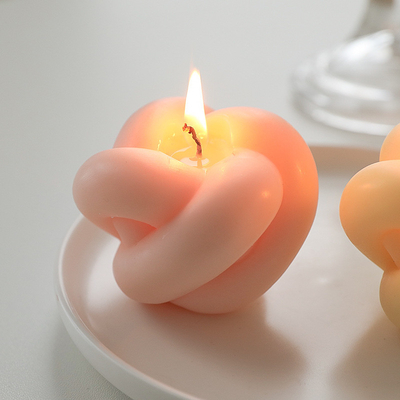Bougie découpée par cire magique mignonne à la maison faite main de soja de parfum de forme de noeud de boule de torsion de décoration de MAISON d'AROME petite