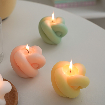 Bougie découpée par cire magique mignonne à la maison faite main de soja de parfum de forme de noeud de boule de torsion de décoration de MAISON d'AROME petite