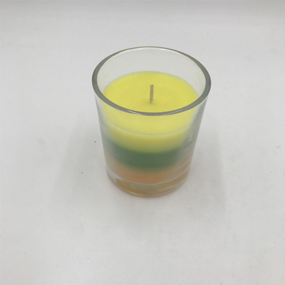 Bougie parfumée posée colorée de solide de paraffine de gradient de maison d'arome