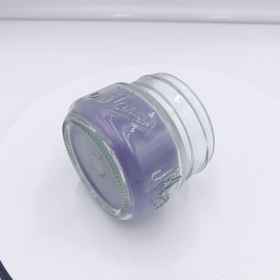 Les associés parfumés mauve-clair d'Aromatherapy mirent pour le massage